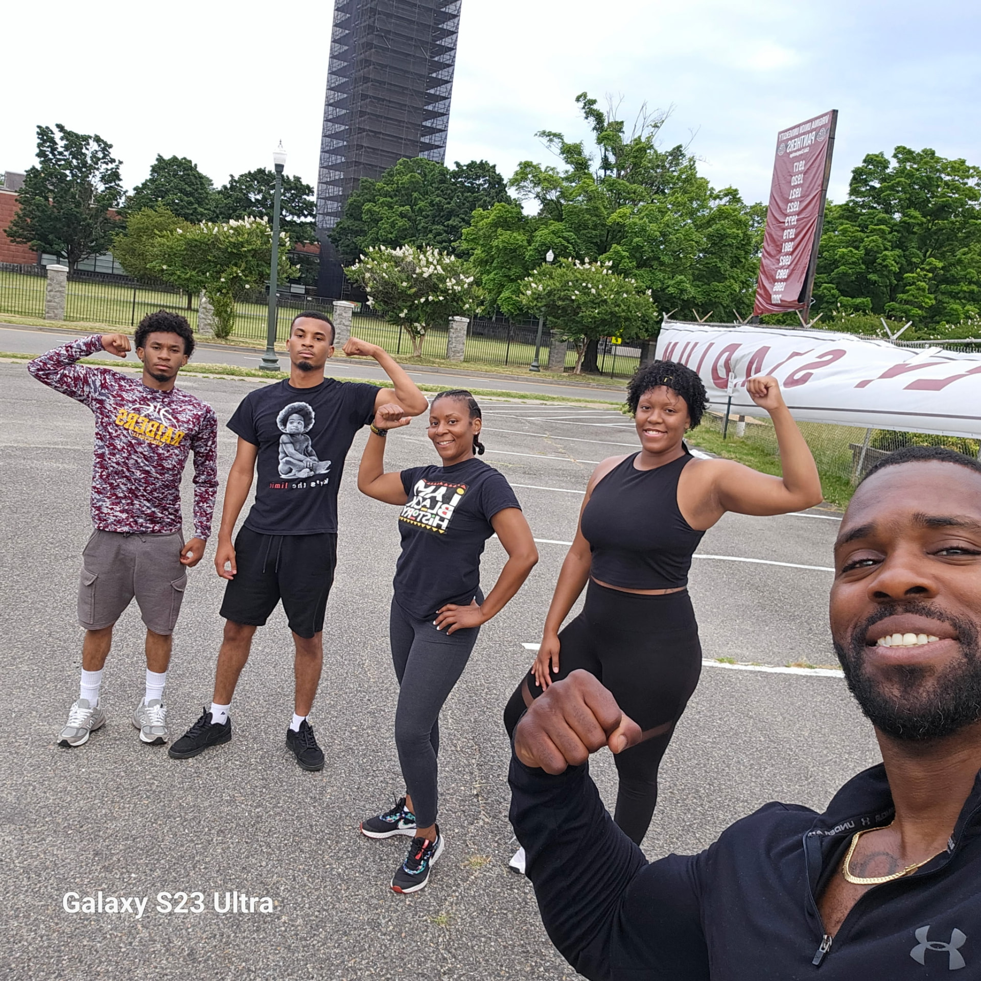 Steve Miller with community members after an outdoor workout at the stadium