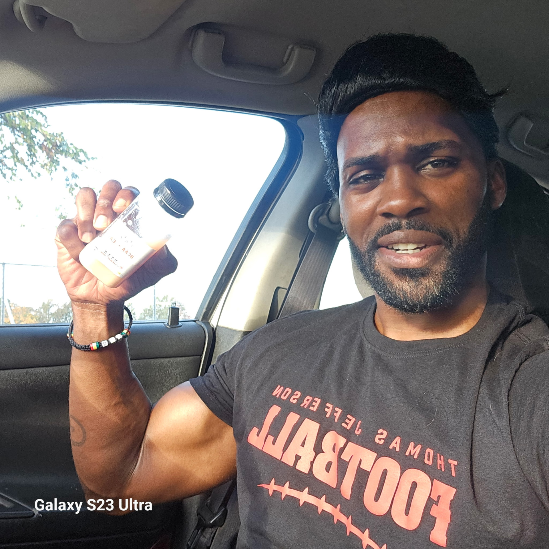 Member with a BCAA+EAA shake on the go